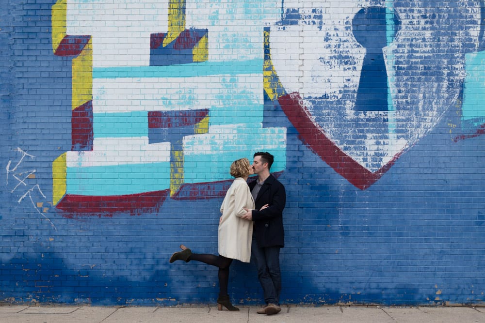couple kissing pointed toe