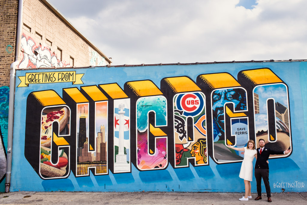 London couple's destination Chicago elopement downtown with Greetings From Chicago mural