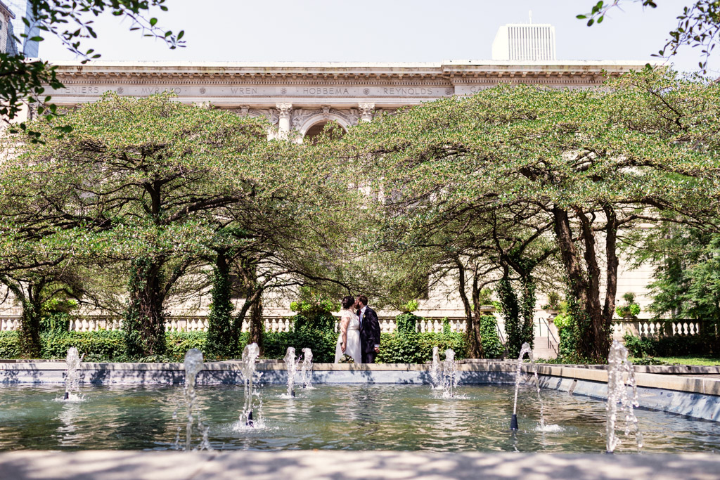 Bride and groom at Art Institute of Chicago gardens after Cultural Center civil ceremony