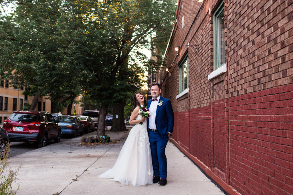 Just married couple outside Mrs. Murphy & Sons Irish Bistro wedding reception