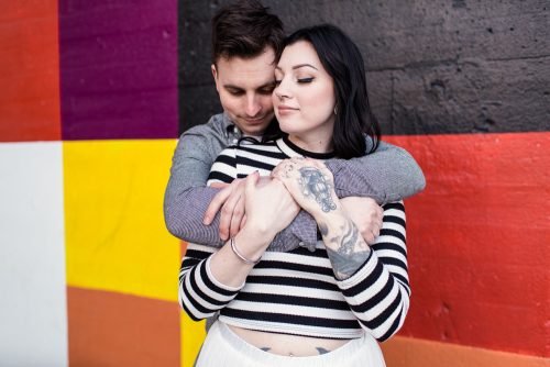 Colorful urban Chicago engagement session with West Loop mural