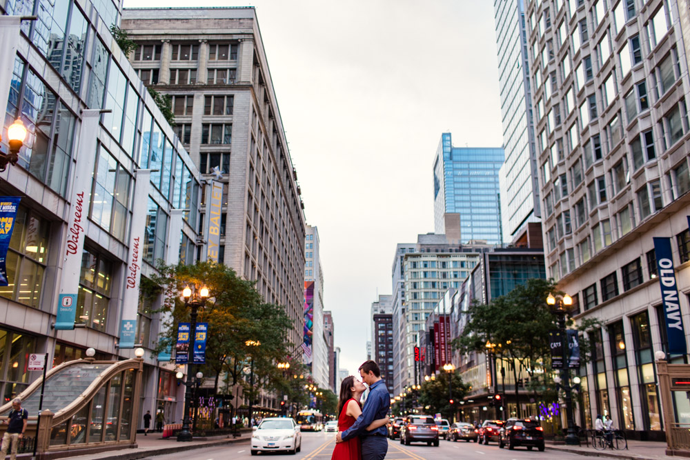 Summer downtown Chicago engagement session on State Street with city lights