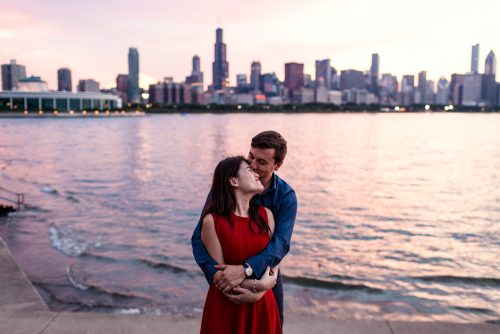 Romantic Chicago engagement session with skyline and sunset at Adler Planetarium