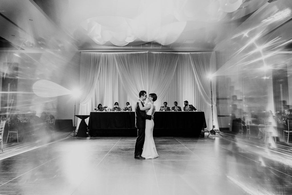 Creative photo of bride and groom's romantic first dance at Loew's Chicago hotel wedding