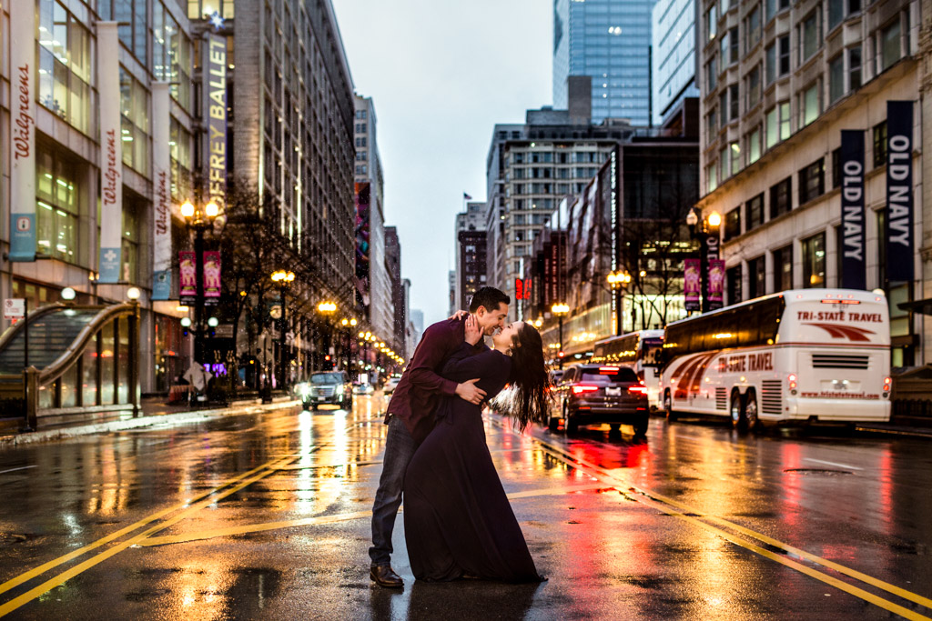 Romantic Chicago winter engagement session downtown in snow and rain
