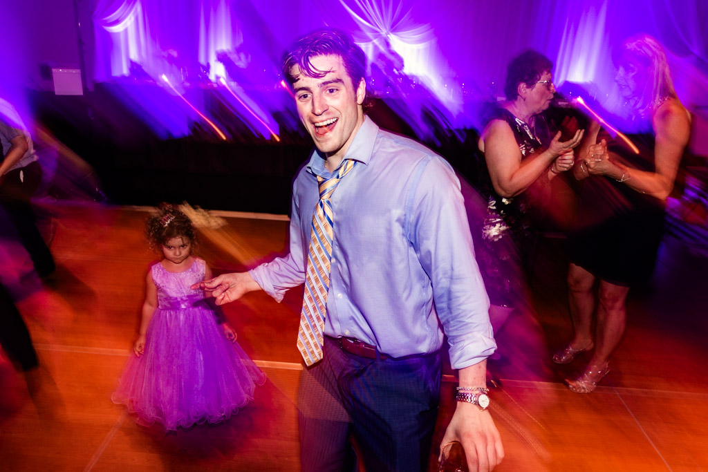 Happy guests on dance floor during Loews Chicago wedding reception