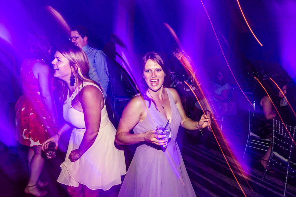 Guests enjoy open dance floor at Loews Chicago wedding reception