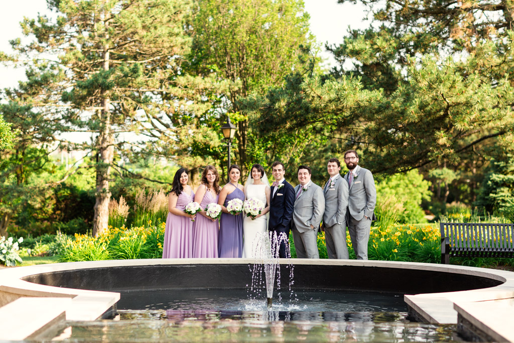 Wedding party in gray and lavender at Illinois forest preserve before summer Loews Chicago wedding reception