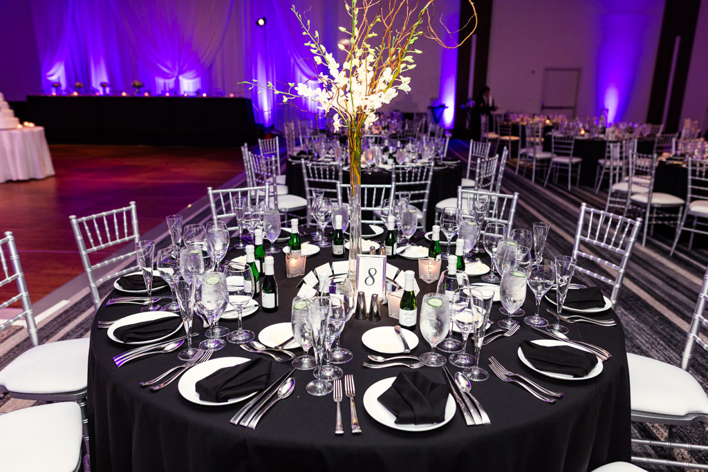 Black and white table decor and floral centerpiece at Loews Chicago wedding reception