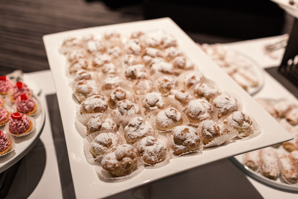 Mini cream puff pastry spread on dessert table at Loews Chicago wedding