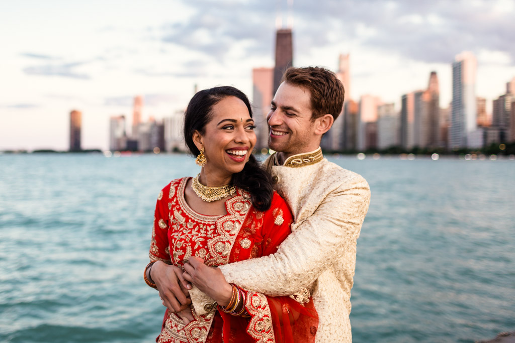 Chicago bride and groom in Indian wedding attire with Chicago skyline