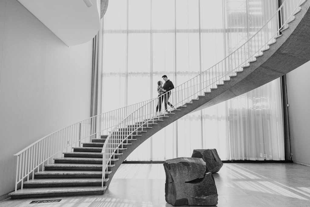 Iconic Chicago engagement photo on staircase at the Art Institute of Chicago