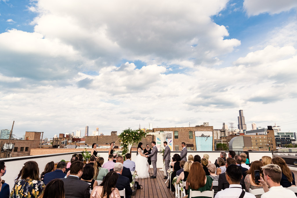 Chicago rooftop wedding ceremony at Ignite Glass Studios