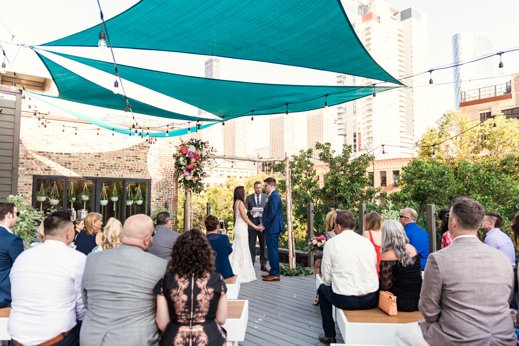 Intimate rooftop wedding ceremony at Little Goat Diner in Chicago's West Loop neighborhood