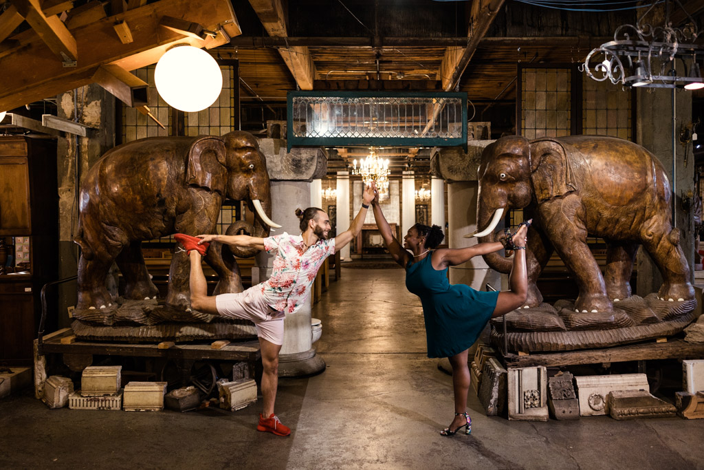 Chicago yoga instructors strike a pose with elephant statues at their Salvage One engagement session