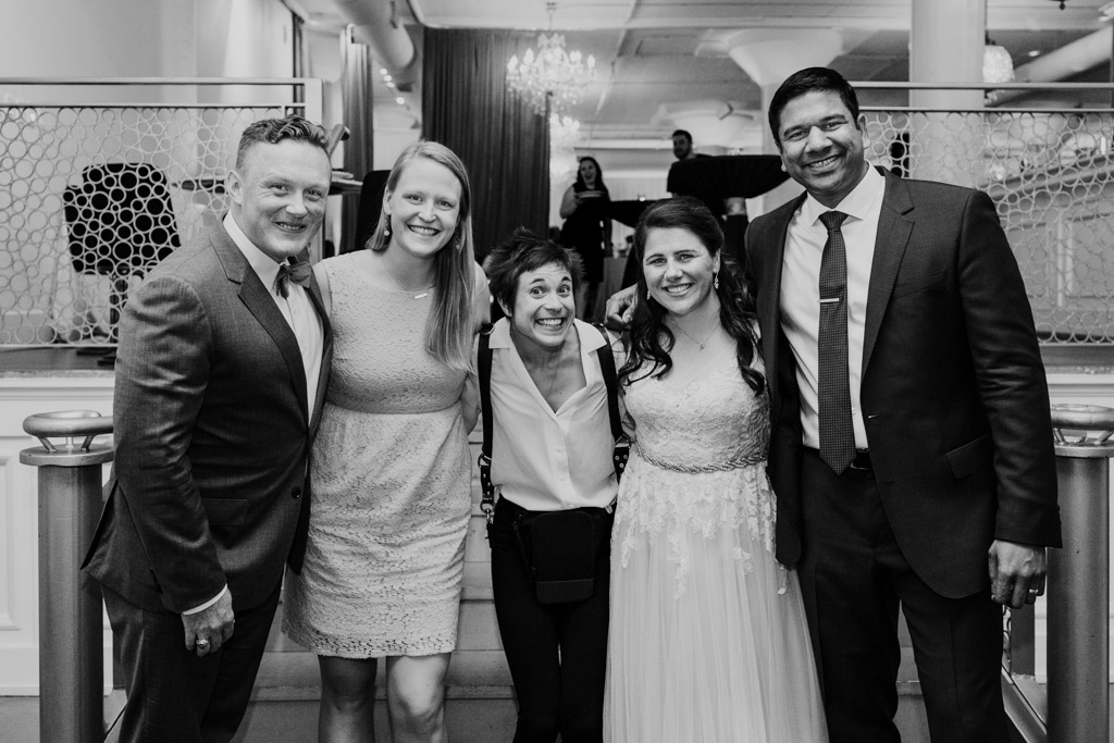 Documentary wedding photographer Emma Mullins Photography with past and present newlyweds at Chicago wedding venue Room 1520