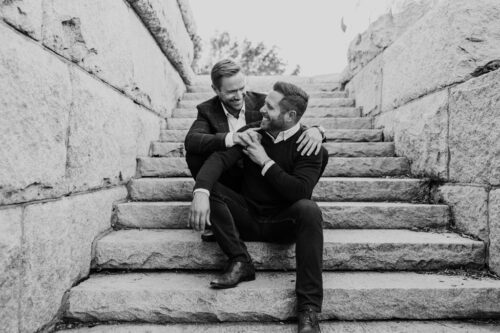 Lincoln Park engagement photo of two grooms on steps of Grant Monument