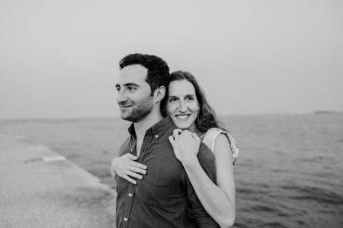 Black and white photo of happy couple at North Avenue Beach during summer Chicago engagement session