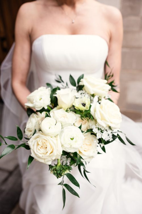 Bride holding her bouquet on University of Chicago campus