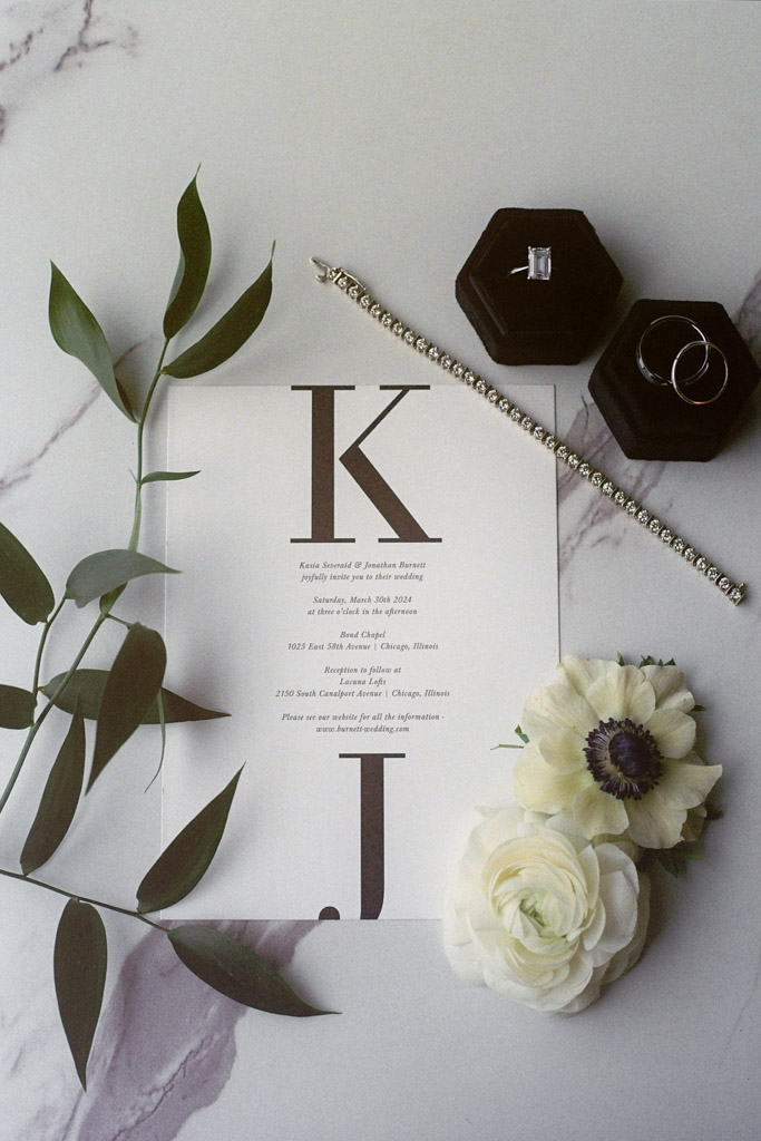 Black and white minimal style invitation with bridal details for University of Chicago wedding ceremony