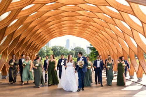 Wedding party walks beneath the Honeycomb in Lincoln Park Chicago