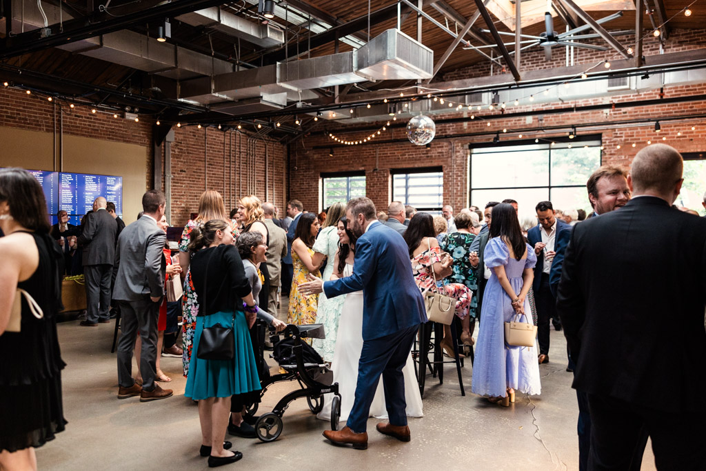 Guests during cocktail hour at Ovation Chicago wedding reception