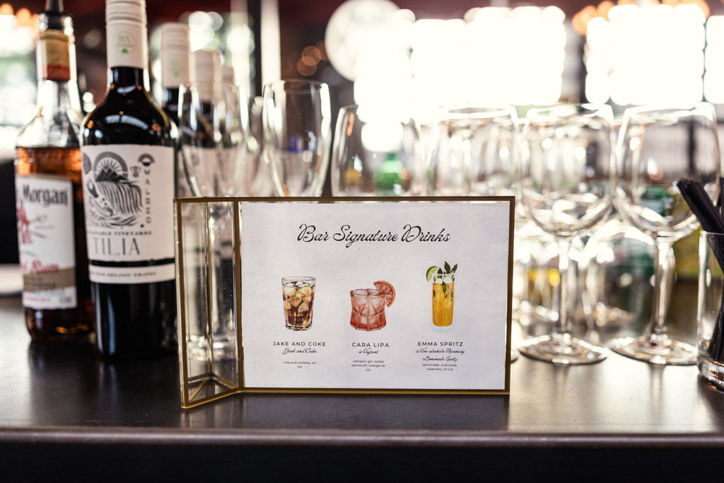 Custom signature cocktail sign on bar for Ovation Chicago wedding reception