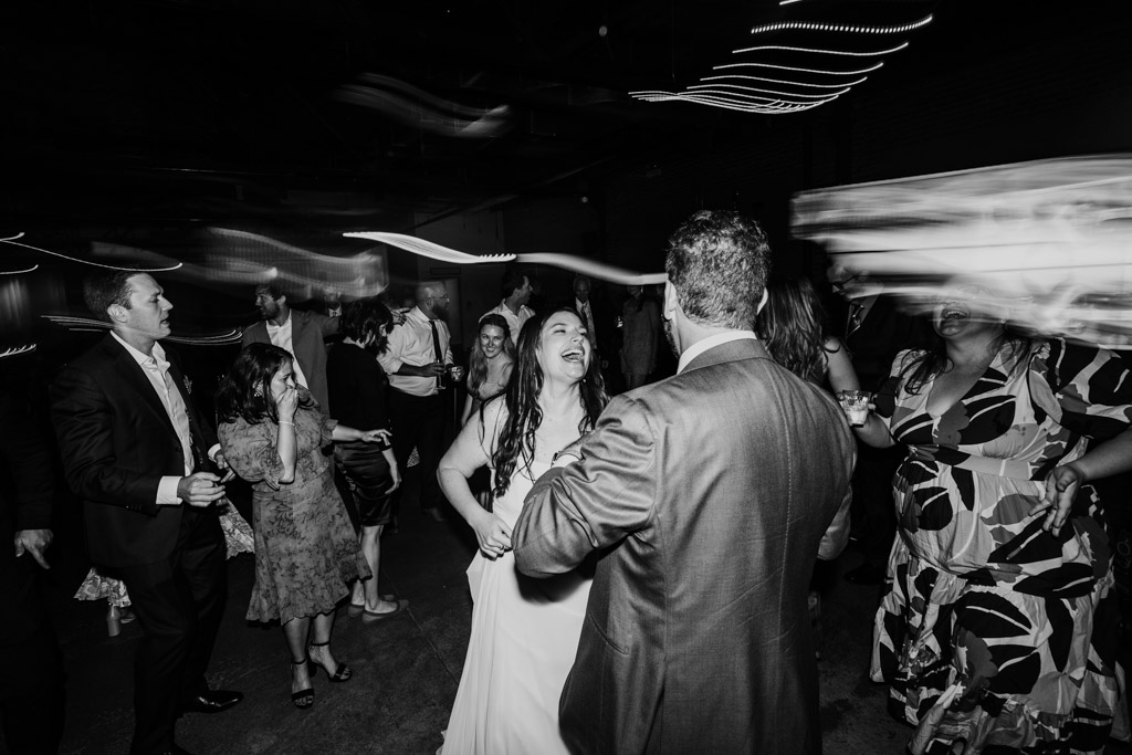 Black and white photo of newlyweds on the dance floor during their Ovation Chicago wedding reception