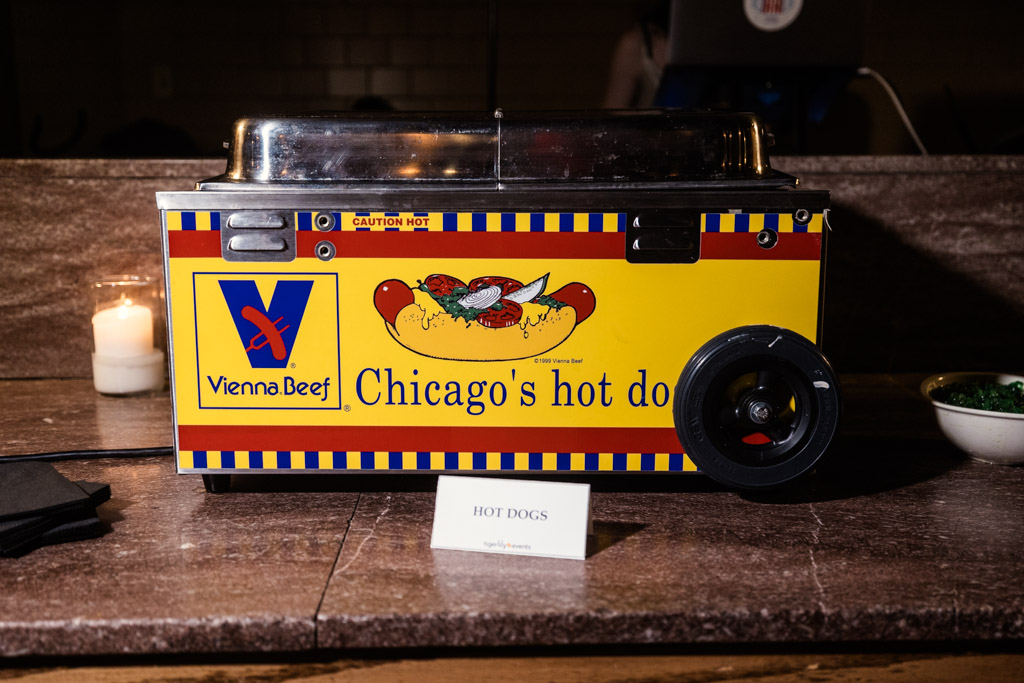 A miniature Vienna Beef Chicago hot dog cart with a