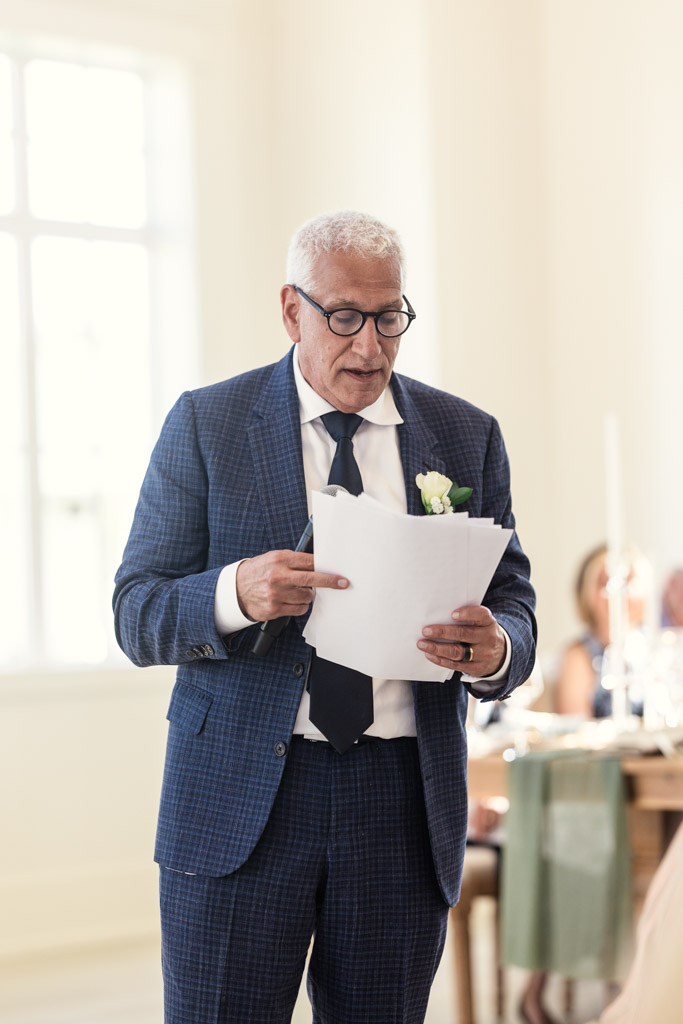 Father of the bride gives speech during Être Farms wedding reception
