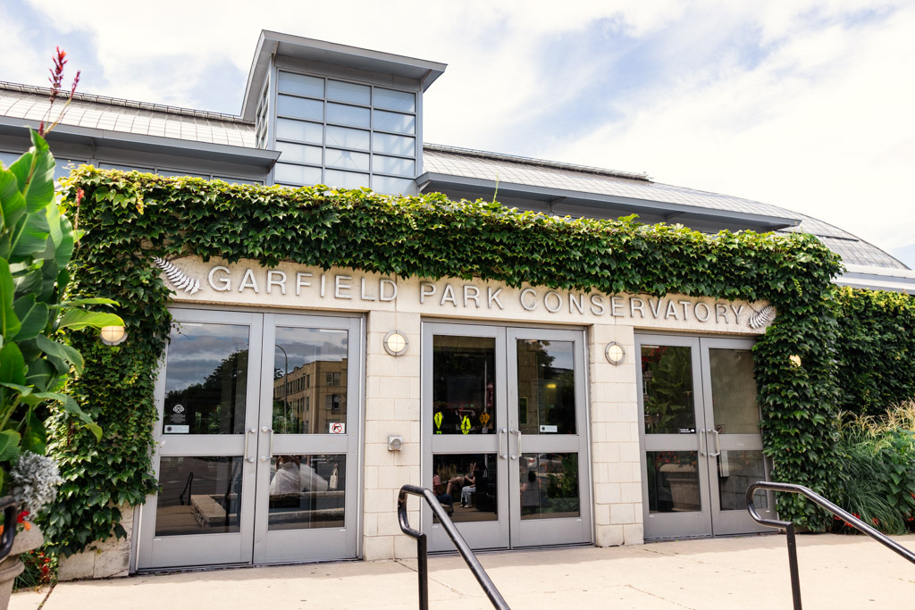 Entrance of Garfield Park Conservatory covered in green ivy