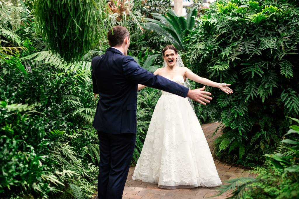 Bride and groom during their first look in the Fern Room at Garfield Park Conservatory