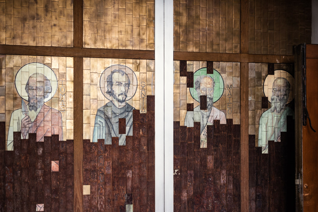 Painted mural of saints on wall of Parroquia San Cayetano in Mexico City