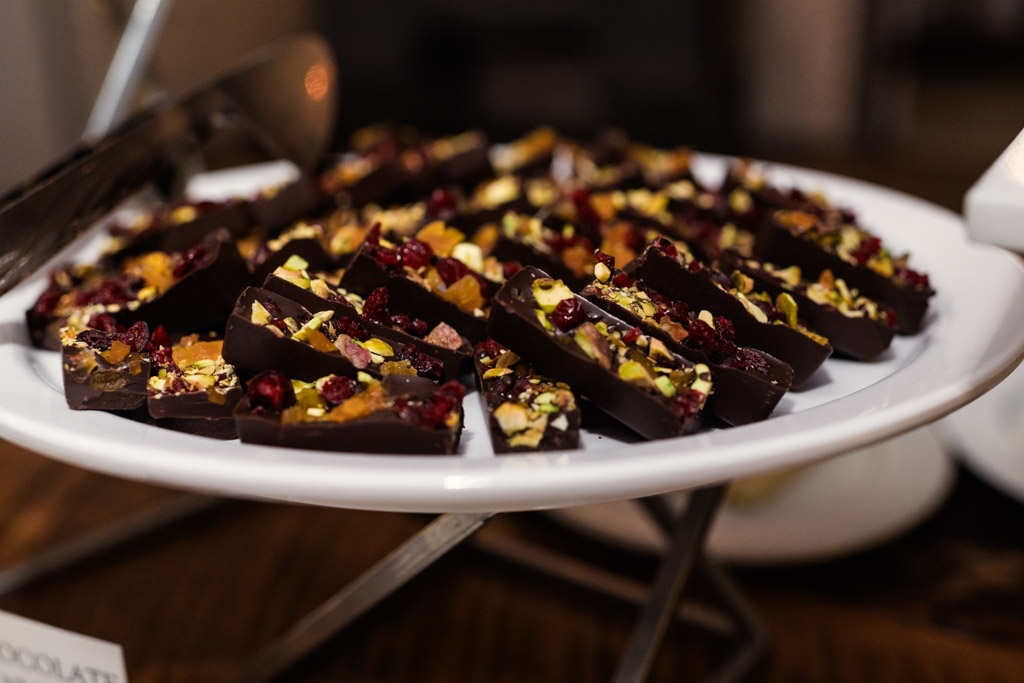 Chocolate desserts arranged on a white plate for Firehouse Chicago wedding reception