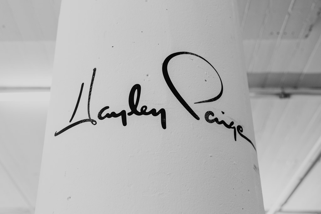 Black cursive signature reading