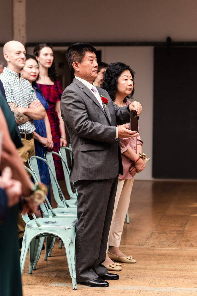 Bride's parents during wedding ceremony at The Joinery in Chicago