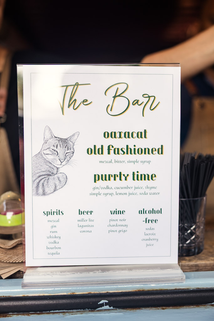 Custom bar menu with a cat illustration for wedding reception at The Joinery in Chicago