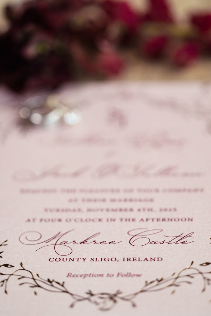 Detail photo of a Markree Castle wedding invitation with elegant floral details