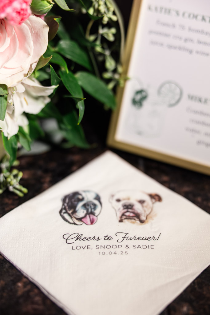 Custom napkin with illustrations of newlyweds' dogs for Mon Ami Gabi wedding reception