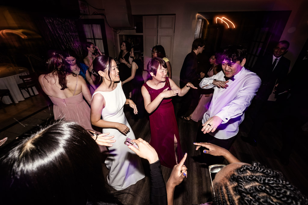 Bride and guests on the dance floor during Salvatore's wedding reception