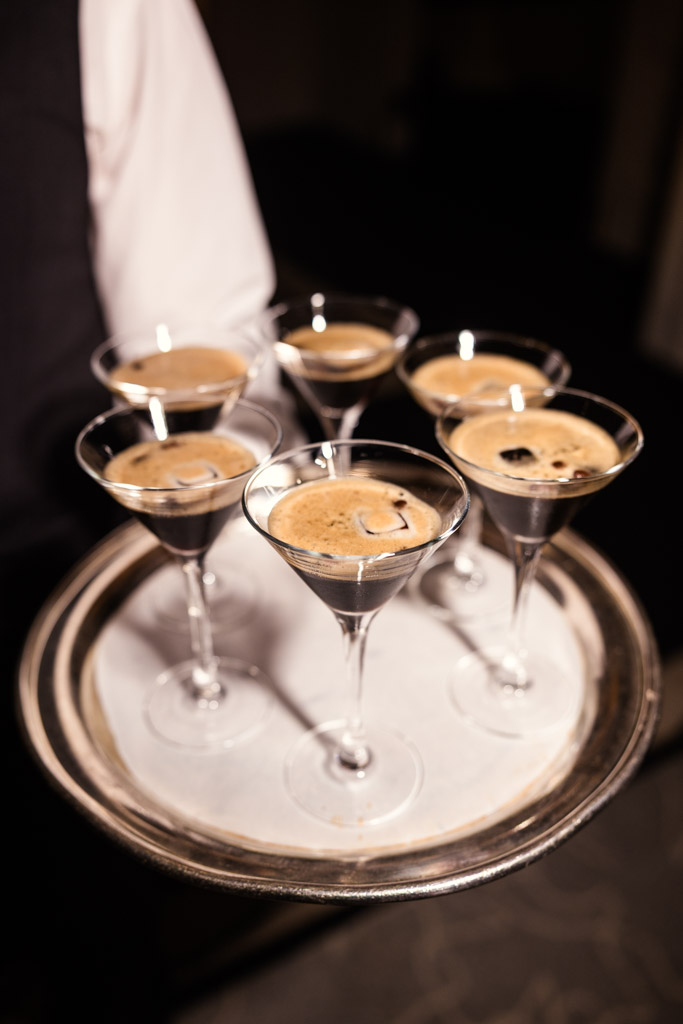 Tray of six espresso martinis in elegant cocktail glasses for Four Seasons Chicago wedding reception