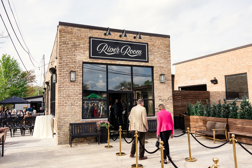 Entrance of River Room at Burning Bush Brewery, a brick building with large windows