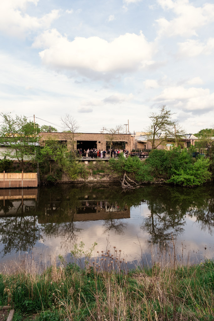View of River Room at Burning Bush Brewery from across the river in Horner Park